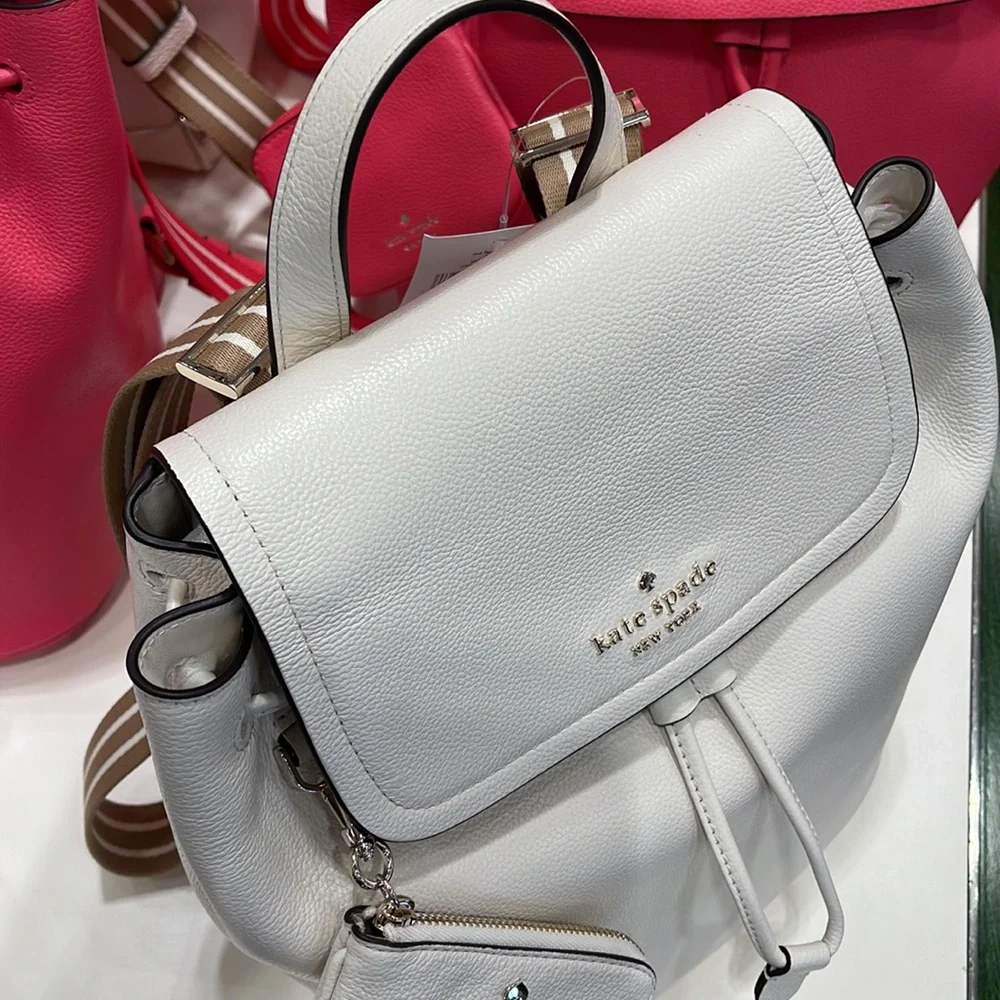 Kate Spade Rosie Medium Flap Backpack 
K8714 pebbled leather Parchment rosie
NWT - Picture 3 of 16